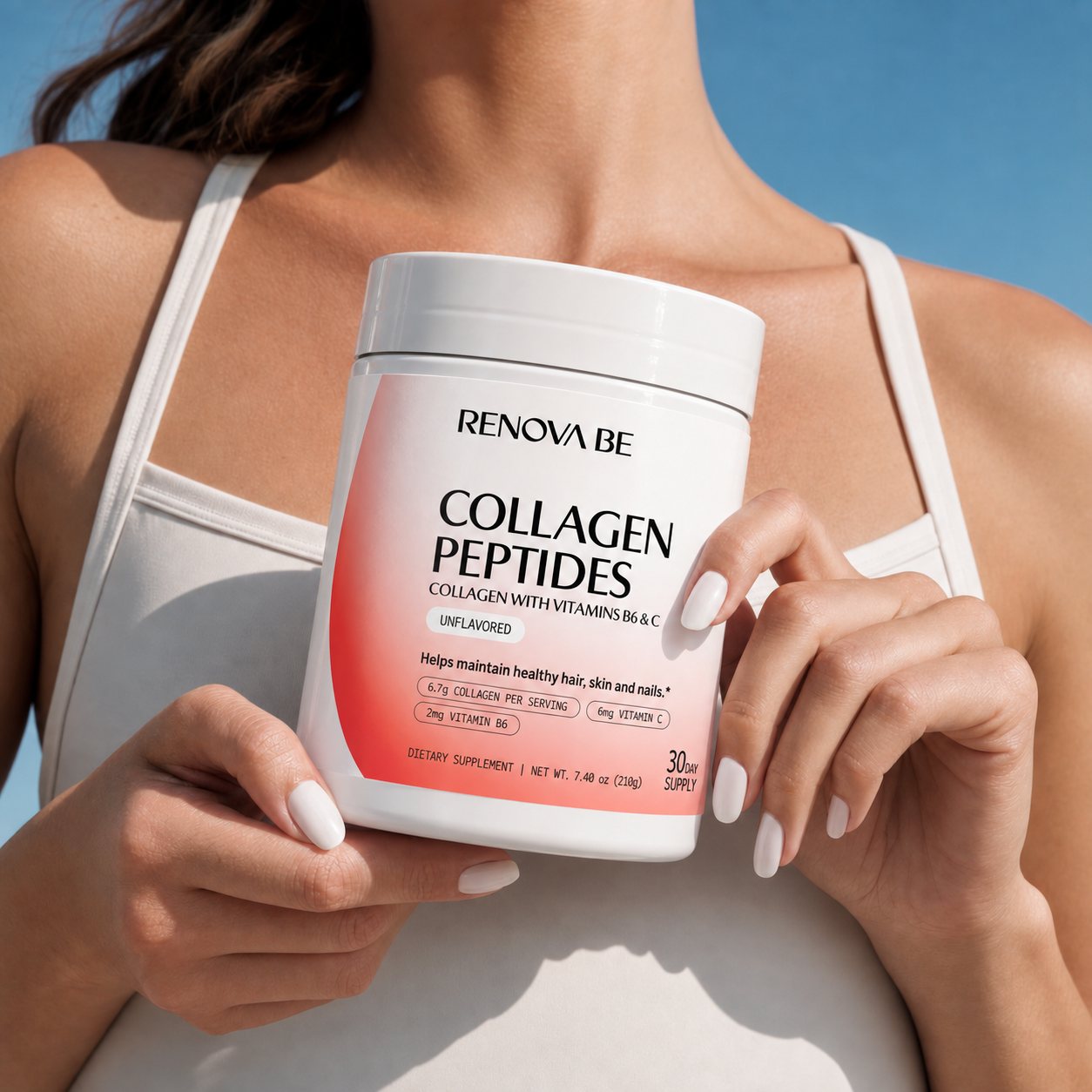 Woman holding a jar of Collagen Peptides